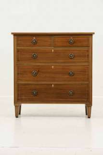 This dresser is made of solid mahogany in its original finish. The 