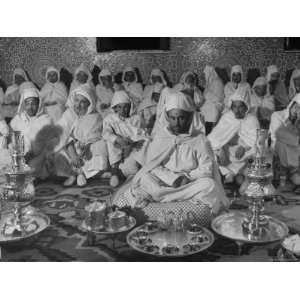  Men Participating in a Tea Ceremony for the Marriage of 