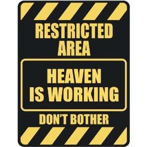 RESTRICTED AREA HEAVEN IS WORKING  PARKING SIGN 