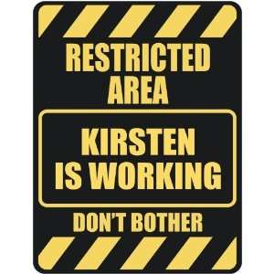   RESTRICTED AREA KIRSTEN IS WORKING  PARKING SIGN
