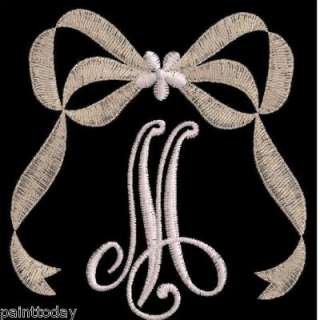 This set includes all capital letters as shown, with a large bow. The 