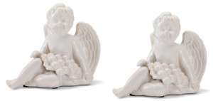 Two (2) porcelain grape cherub garden sculpture statues  