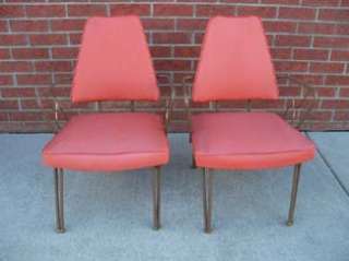 Fantastic pair of Mid Century Modern Orange Vinyl Douglas Eaton Chairs 