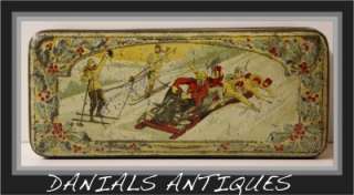 Antique christmas people on sledge Biscuit toffee tin.1920s  
