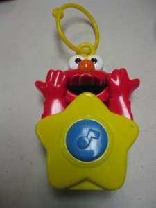 Tyco Press 1996 Sesame Street Elmo Talking/Singing Crib Side Toy Clips 