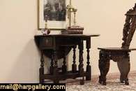   is a country dropleaf table and was hand hewn from oak chestnut and