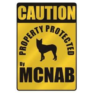    PROPERTY PROTECTED BY MCNAB  PARKING SIGN DOG
