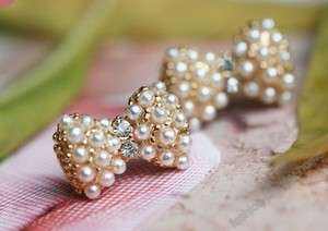 Fashion gold plated crystal Imitation pearl bowknot earrings  