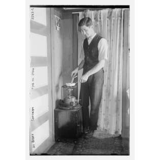 Library Images Photo (M) At Braod Channel   the oil stove, 16 x 20in 