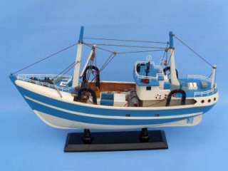   shipped as pictured features i m hooked 19 not a model ship kit attach