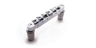 This is a chrome bridge for a Les Paul or similar type guitar. These 