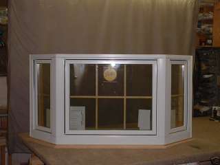 CUSTOM BAY WINDOW 62W X 32 1/2H RO NEW PELLA WINDOWS  