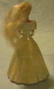 This MCDONALDS BARBIE WEDDING DRESS DOLL WITH PINK FLOWERS is in 