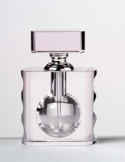 This beautiful pale pink crystal perfume bottle is very modern and the 