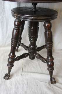 L54 ANTIQUE PIANO STOOL WITH ORNATE GLASS BALL AND CLAW FEET  