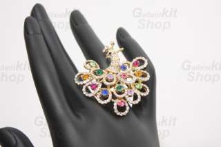 Peacock design ring with 14 colored RHINESTONES. It is charming and 