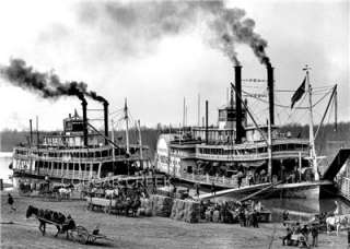   Two Mississippi Paddle Wheel Steamers Being Loaded With Hay And Grain
