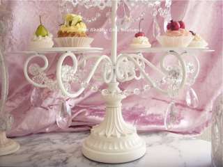  cupcake holder has a center cake tray measuring 7 inches wide 