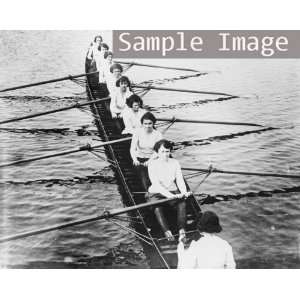   Wellesleys 1922 varsity crew. Women rowing a shell.