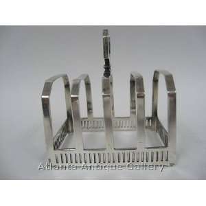 Piece Angular Silverplate Toast Rack. 